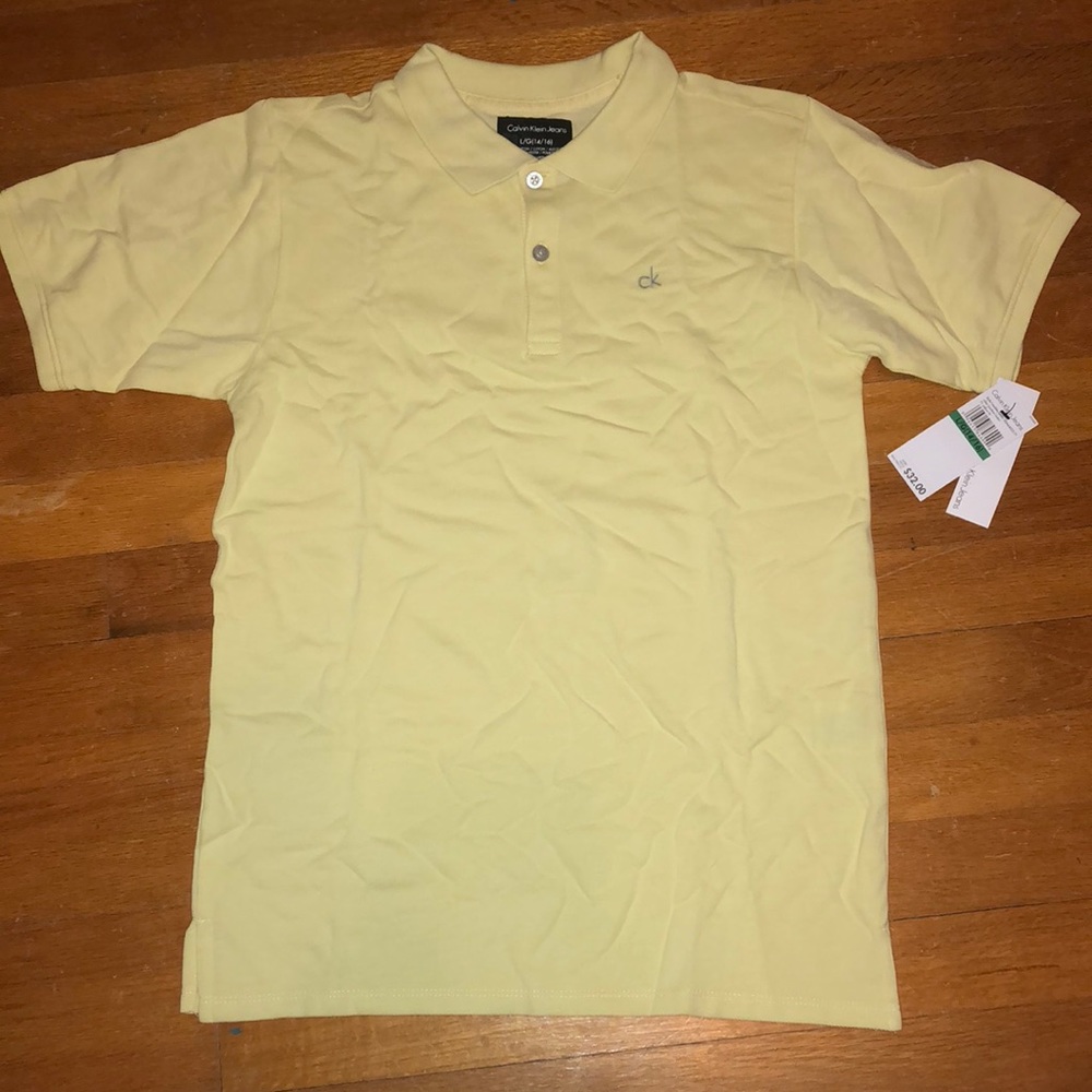 BNWT Calvin Klein Boys Yellow Polo SZ.14/16 (729